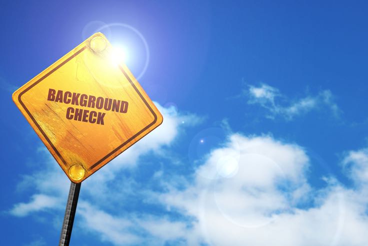 Background check street sign, cloudy blue sky