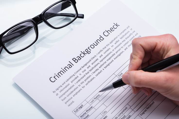 Filling out criminal background check paperwork